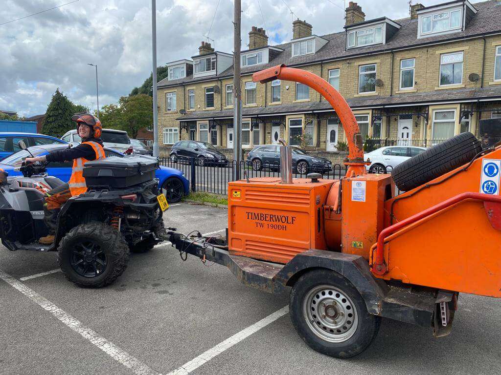 tree-surgeon-chipper Tree surgeon towing a chipper through Bradford